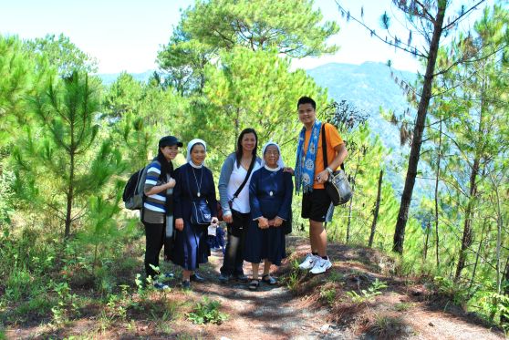 L-R: Me, Ate Josie, our guide, the missionary sisters and my friend Leo