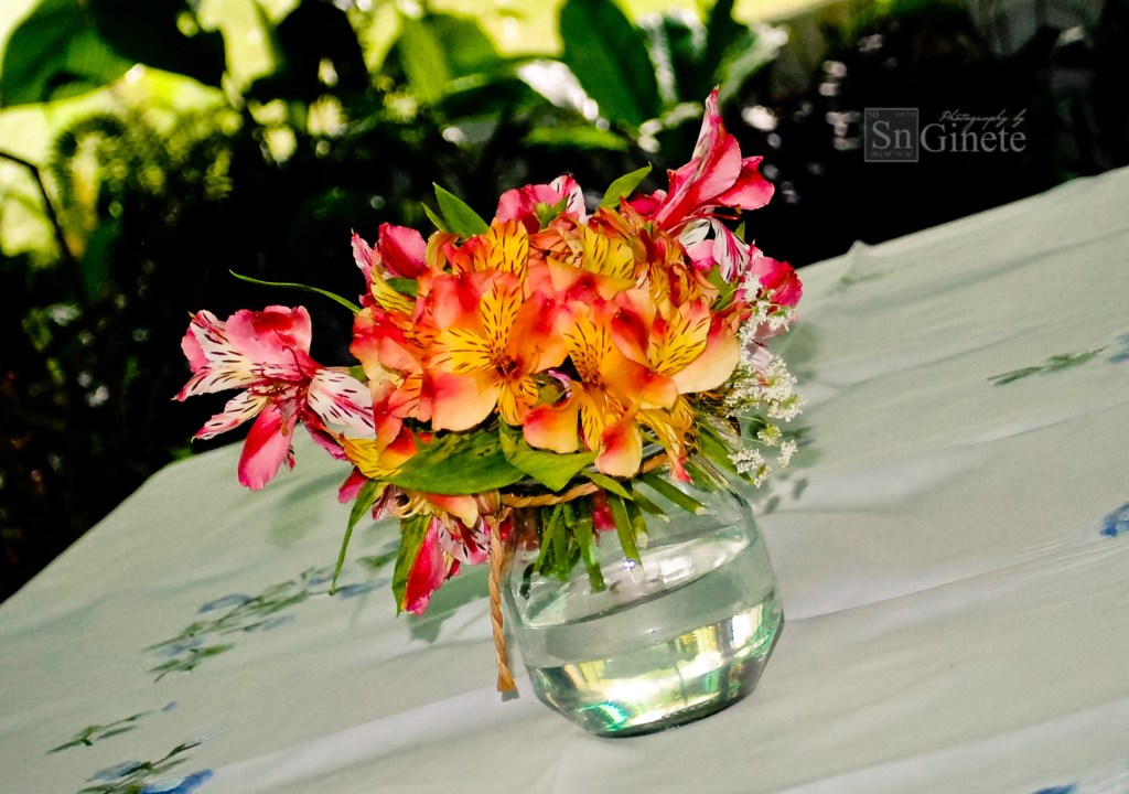 Fresh flowers in a vase centerpiece.